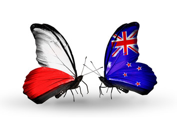 Two butterflies with flags Poland and New Zealand