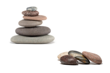 Pebbles and Cairn with Focus on Foreground
