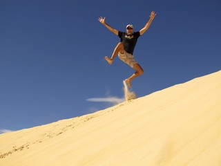 Dune jumping, Fraser Island, Queensland, Australia