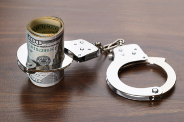 Dollar Bills With Handcuffs
