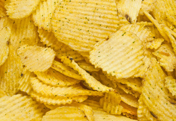 heap of tasty corrugated potato chips