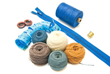 different balls of yarn and meter