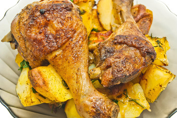 plate with tasty chicken and potatoes