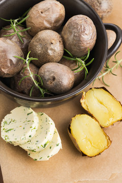 baked potatoes with herbs butter