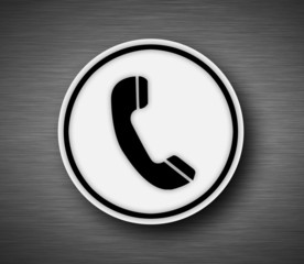 Phone icon on metalic background