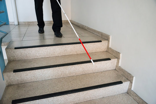 Blind Man Moving Down On Stairway