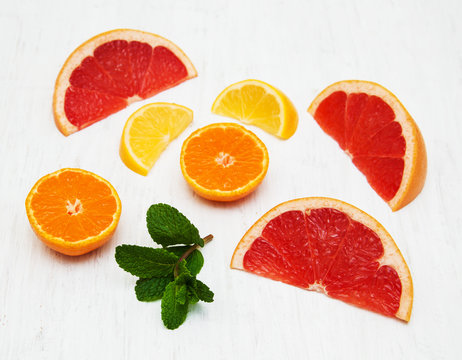 Fresh citrus fruits with green mint
