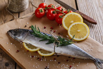 raw mackerel with lemon tomatoes and rosemary