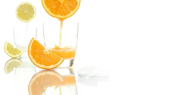 vitamin c concept orange lemon juice aspirin tablet