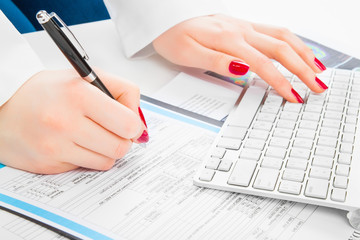 Doctor writing prescription. Selective focus