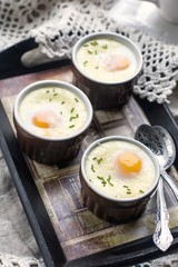 Shirred baked eggs for breakfast
