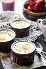 Shirred baked eggs for breakfast
