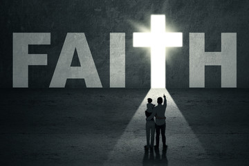 Family in front of faith door