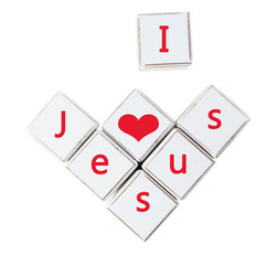 I love Jesus text spelled in cubes isolated on white