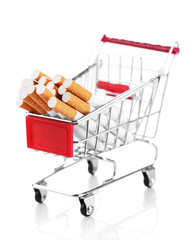Cigarettes in shopping cart isolated on white
