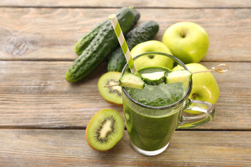 Green fresh healthy juice with fruits and vegetables