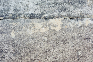 The old grey concrete wall crack background