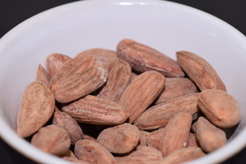 Salted and roasted almonds.