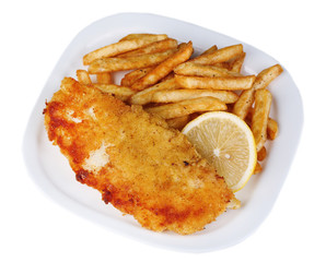 Breaded fried fish fillet and potatoes with sliced lemon