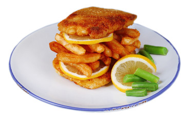 Breaded fried fillet and potatoes with asparagus and sliced