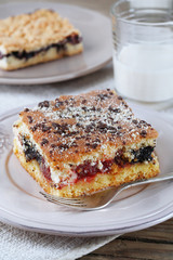 Homemade pies with jam and glass of milk