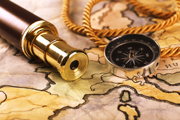 Marine still life with world map and spyglass