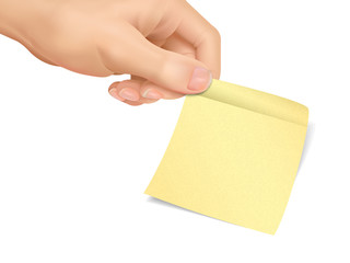business concept: hand holding a sticky note