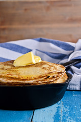 The stack of pancakes with butter