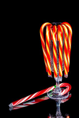 Obraz na płótnie Canvas Candy canes from Christmas unique display
