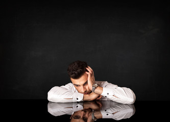 Obraz premium Businessman sitting at a desk