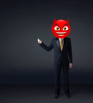 businessman wears devil smiley face