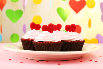 Delicious cupcake for Valentine Day on bright background