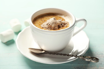 Hot chocolate with marshmallows in mug,