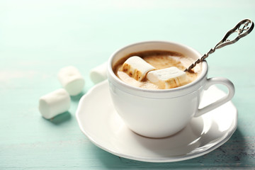 Hot chocolate with marshmallows in mug,
