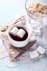 Hot chocolate with marshmallows in mug,