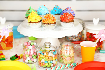 Prepared birthday table with sweets for children party