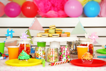 Prepared birthday table with sweets for children party