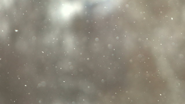 Falling Snow particles closeup,background