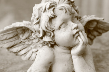 image  of cherub figurine in sepia - 77739743