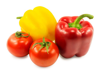 yellow and red bell peppers and tomatoes isolated on white backg