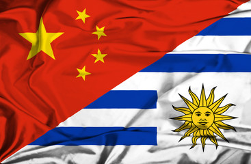 Waving flag of Uruguay and China