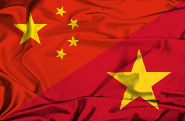 Waving flag of Vietnam and China