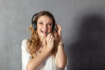 Woman in call center with phone headset