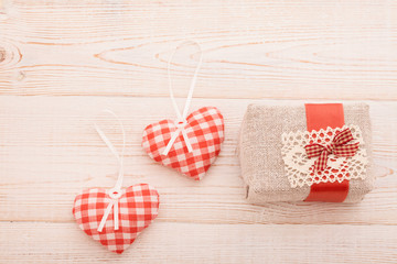 hearts and gift on wooden background.Valentines Day.Beautiful.