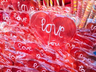 Red heart shaped lollipops with Love