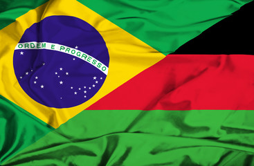 Waving flag of Malawi and Brazil