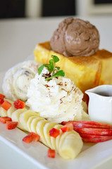honey toast with with fruit and ice cream