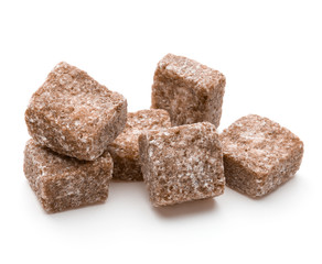 Brown lump cane sugar cube isolated on white background cutout