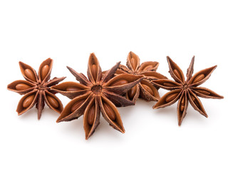 Star anise spice fruits and seeds isolated on white background c