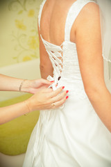 closeup of lace corset wedding dress.